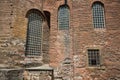 Windows and doors of an old building. Brickwork, lattice windows. Royalty Free Stock Photo